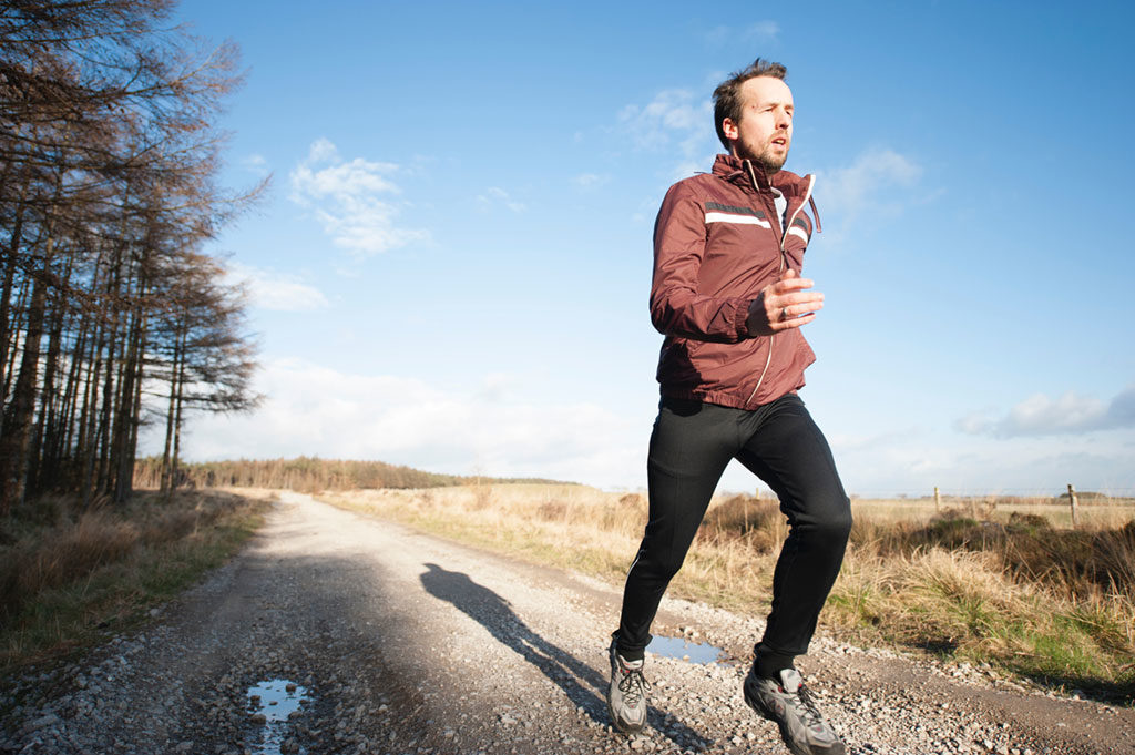 Man running in countryside